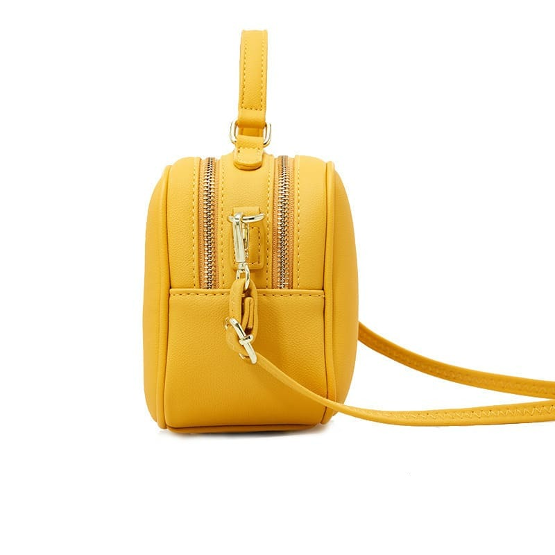 Sienna crossbody bag interior showing the zip pocket