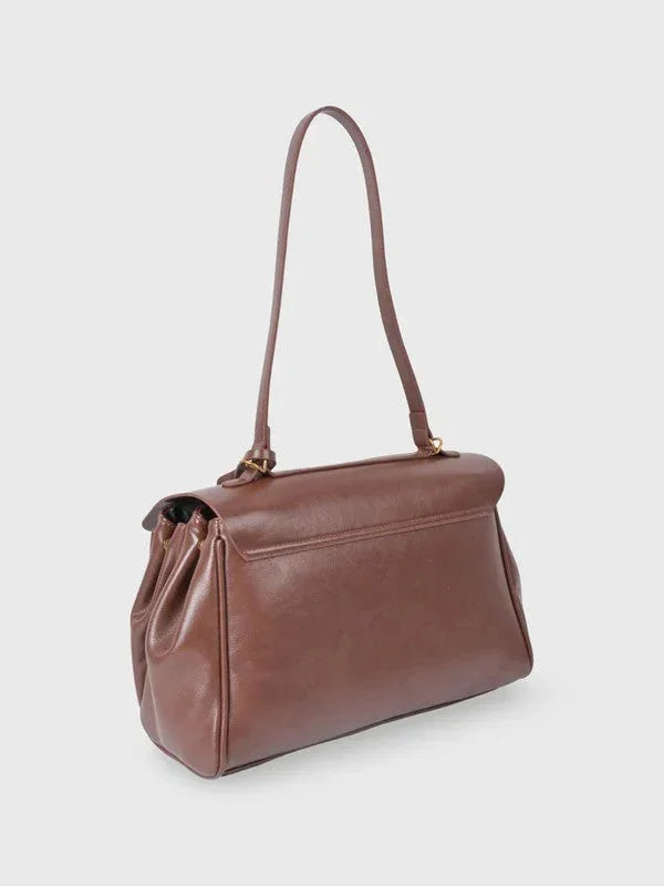 Cecil structured shoulder bag styled in a lifestyle setting