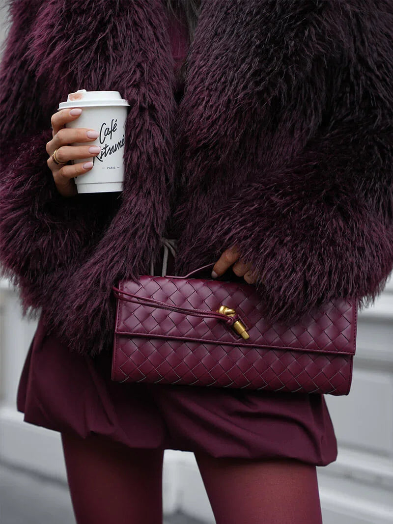 Model styling the Alba shoulder bag with a jacket